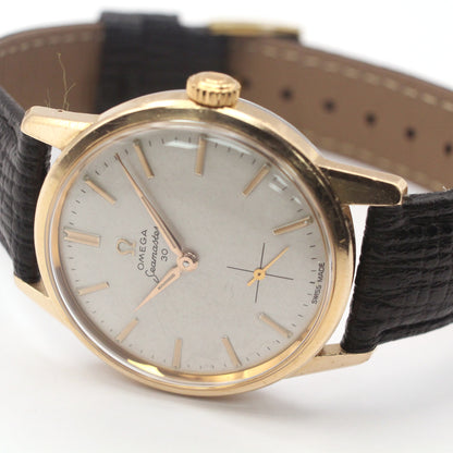 Omega Seamaster 30 in gold-capped steel on leather, 1962. Omega service.