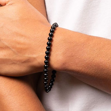 Round Onyx Polished Bead Bracelet in Stainless Steel.