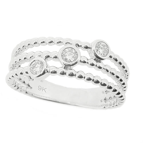 Diamond three stone dress ring in 9ct white gold, 0.15ct