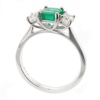 Emerald &amp; diamond three stone ring in Platinum