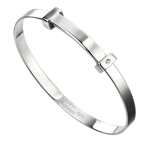 Diamond set child's expanding bangle in silver